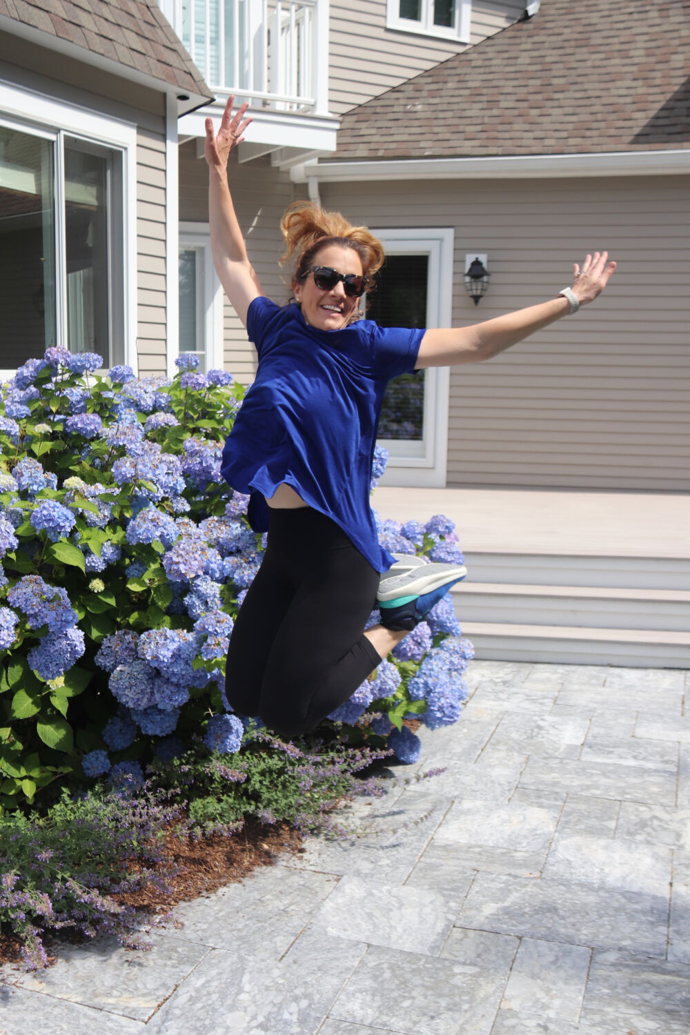 Fashion and Travel Blogger Jumping Pose