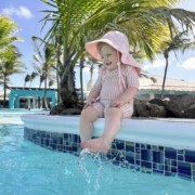 Snapshots from St. Lucia - Lily wearing H&M Swimsuit UPF 50 in pink stripes and Zelda Matilda UPF 50 Toddler Sun Hat