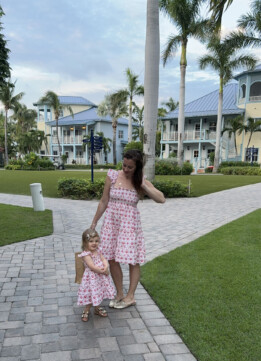 Kelly and Lily in fancy matching dresses from Hill House in Turks and Caicos