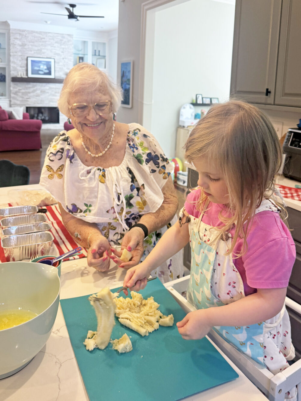 August Fun - Lily and Meme making banana bread